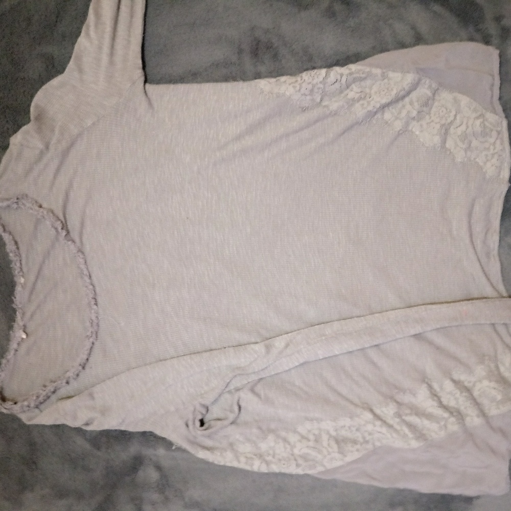 A light grey sweater(lightly worn)